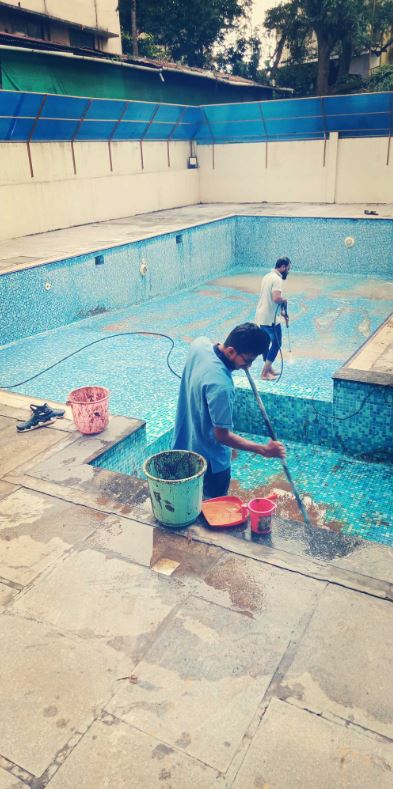Another view of pool cleaning